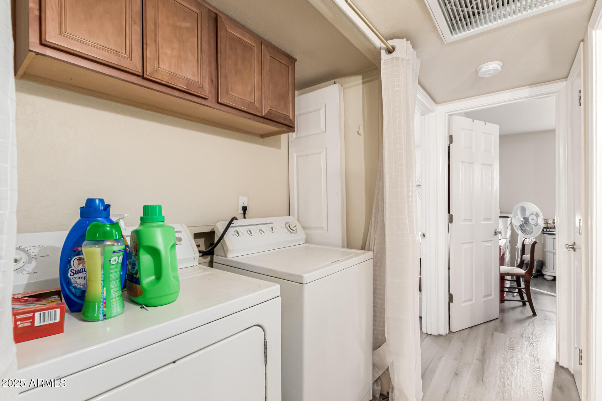 1241 North 48th Street, Unit 106 Phoenix, AZ 85008 - Photo 16 of 17 Inside Laundry with Storage