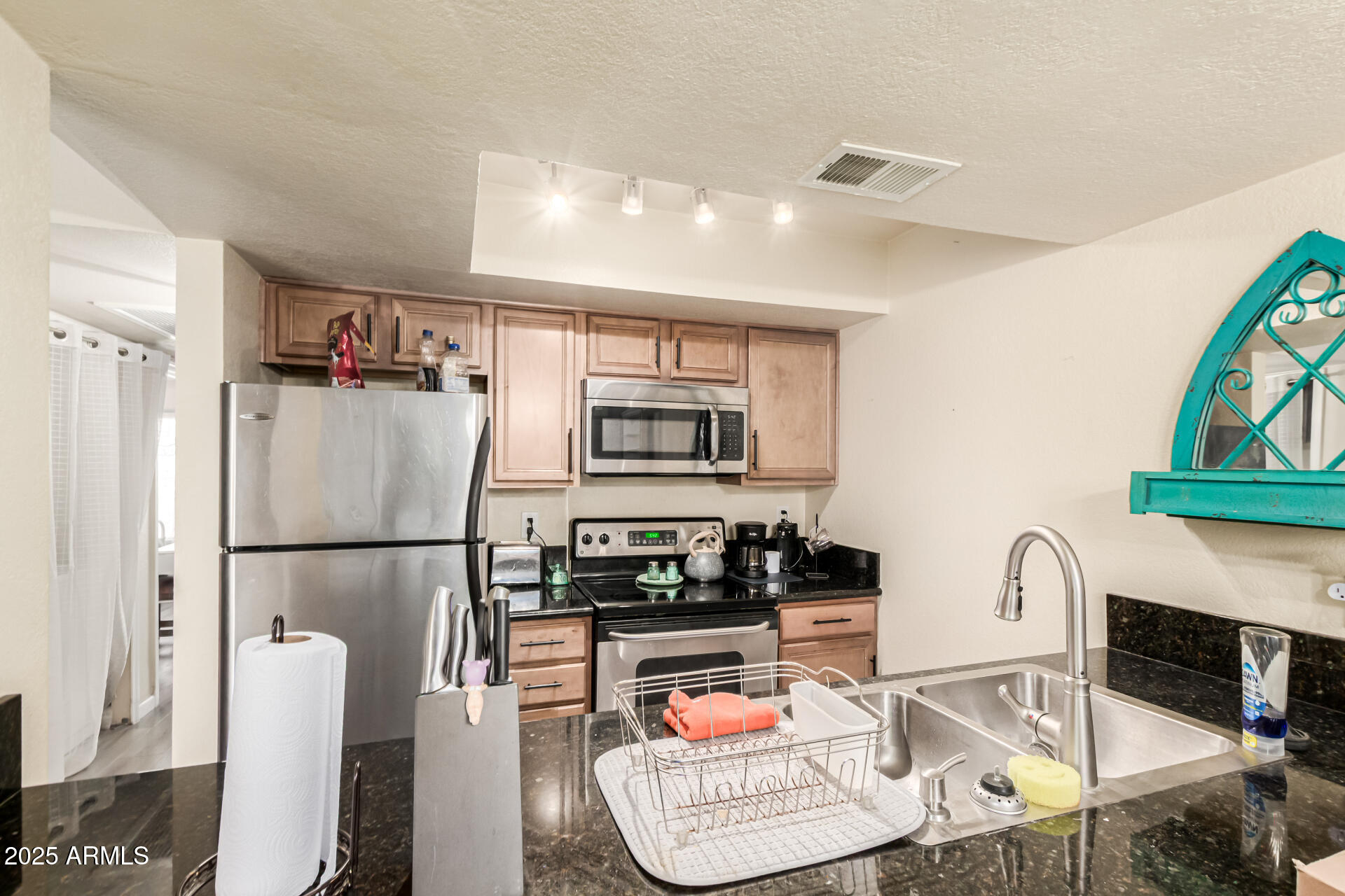1241 North 48th Street, Unit 106 Phoenix, AZ 85008 - Photo 8 of 17 Breakfast Bar to Dining Area