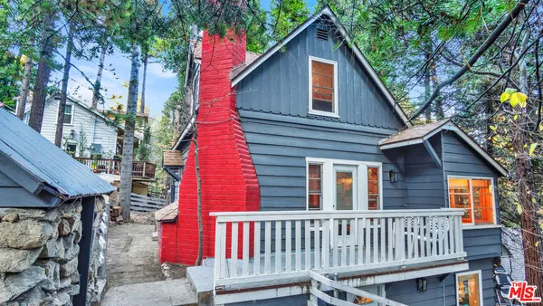 a view of a house with a deck