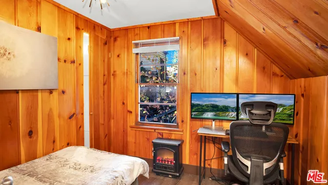 a bathroom with a shower curtain and a shower curtain