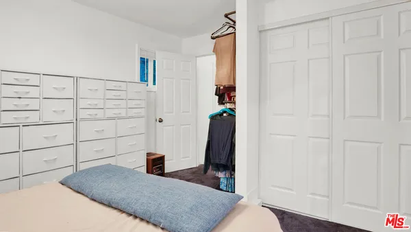 a bathroom with a toilet and a sink