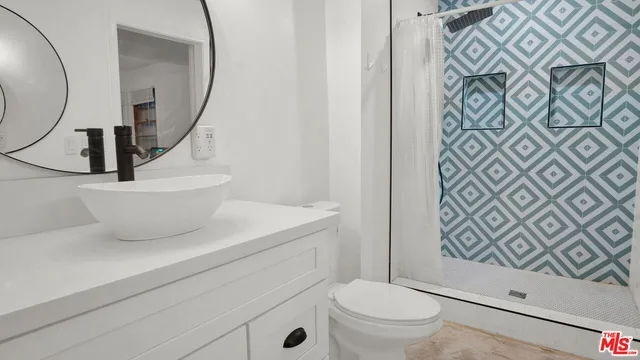 a balcony view with a yard