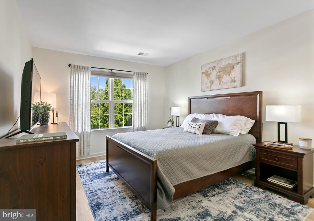 220 Flagstone Road, Unit 6 Chester Springs, PA 19425 - Photo 21 of 32 a bedroom with a bed and a window