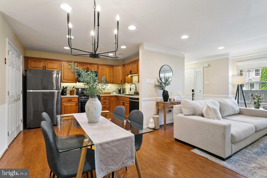 220 Flagstone Road, Unit 6 Chester Springs, PA 19425 - Photo 8 of 32 a living room with fireplace furniture and a large window