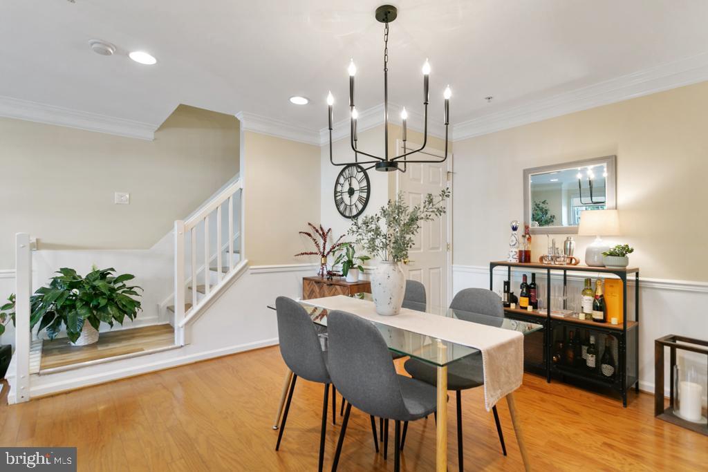 220 Flagstone Road, Unit 6 Chester Springs, PA 19425 - Photo 9 of 32 a dining room with furniture and wooden floor