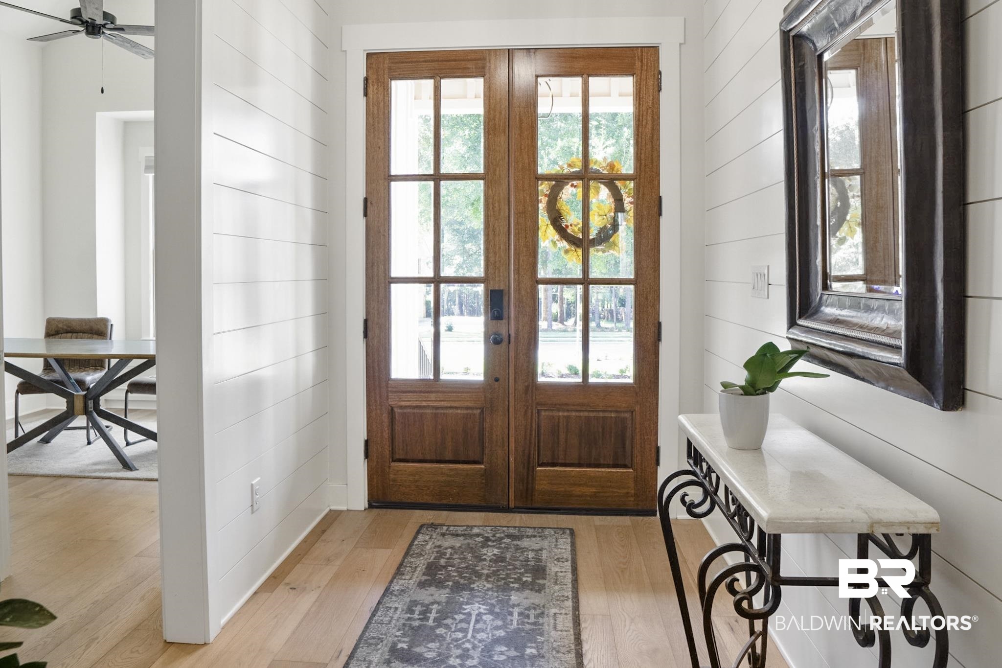 11258 Redfern Road Daphne, AL 36526 - Photo 5 of 44 Doorway with plenty of natural light, french doors, and wood finished floors