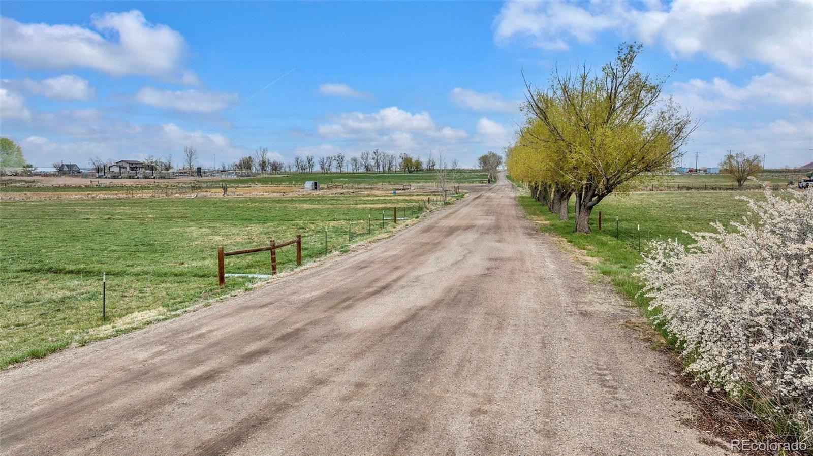 8 Road Fort Fort Lupton, CO 80621 - Photo 3 of 4 a view of a lake with a big yard