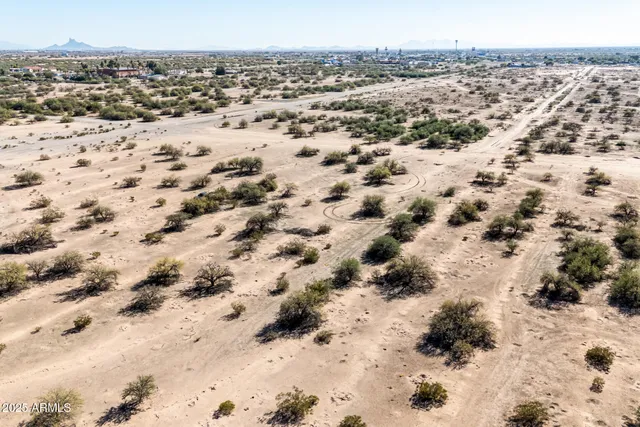 a view of a covered with snow on the road