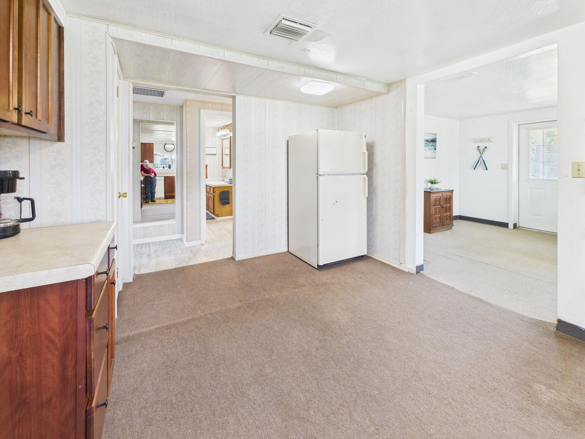 3302 Southeast 34th Avenue Okeechobee, FL 34974 - Photo 12 of 54 a view of a kitchen with a sink
