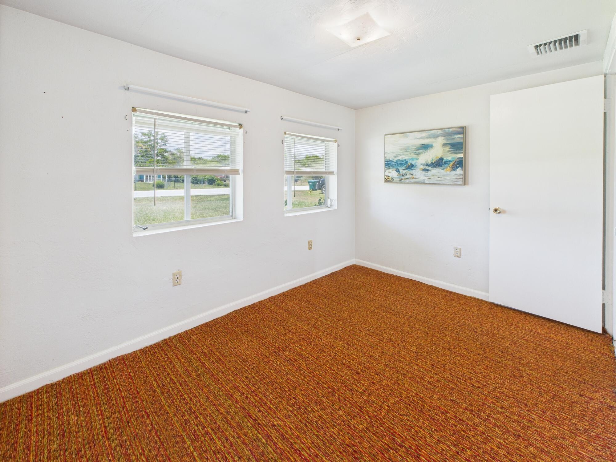 3302 Southeast 34th Avenue Okeechobee, FL 34974 - Photo 15 of 54 an empty room with a window