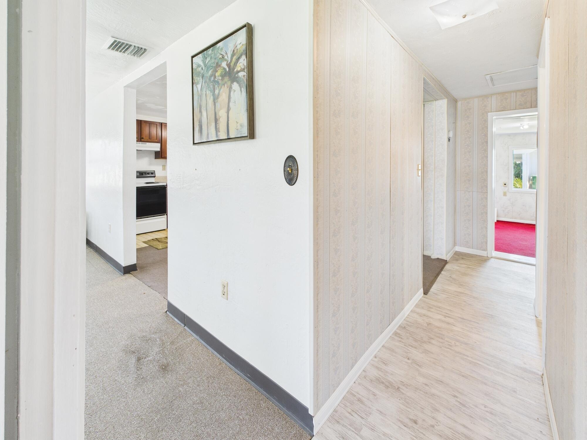 3302 Southeast 34th Avenue Okeechobee, FL 34974 - Photo 16 of 54 a very nice looking hallway with white walls