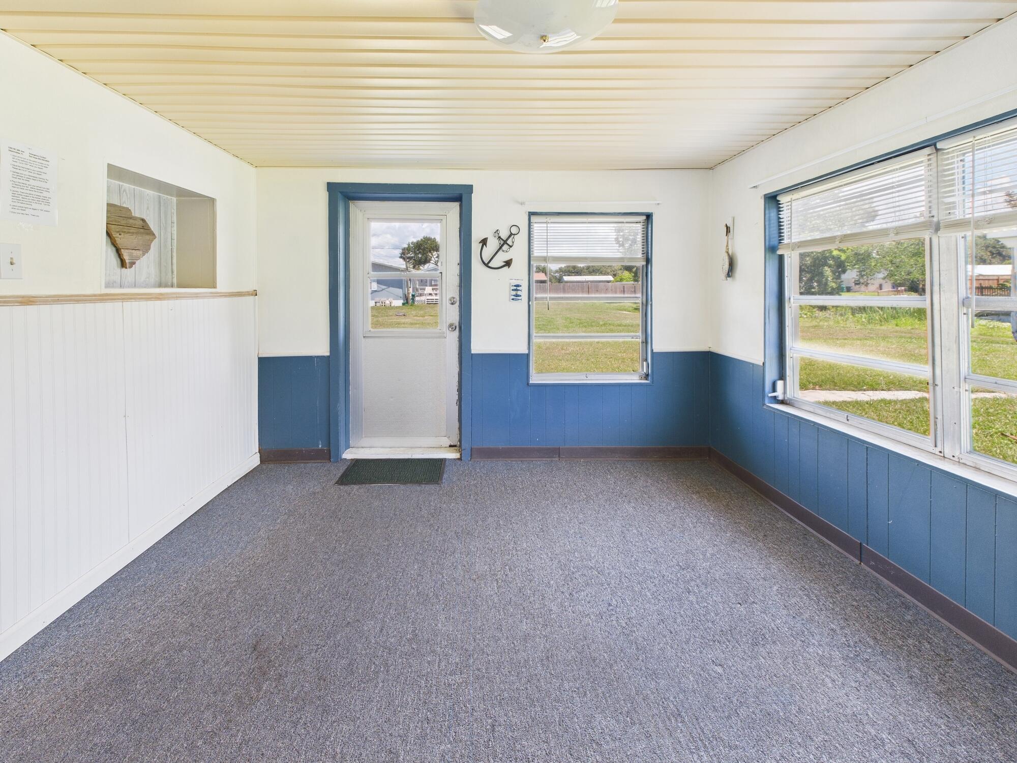 3302 Southeast 34th Avenue Okeechobee, FL 34974 - Photo 30 of 54 a view of an empty room with a window