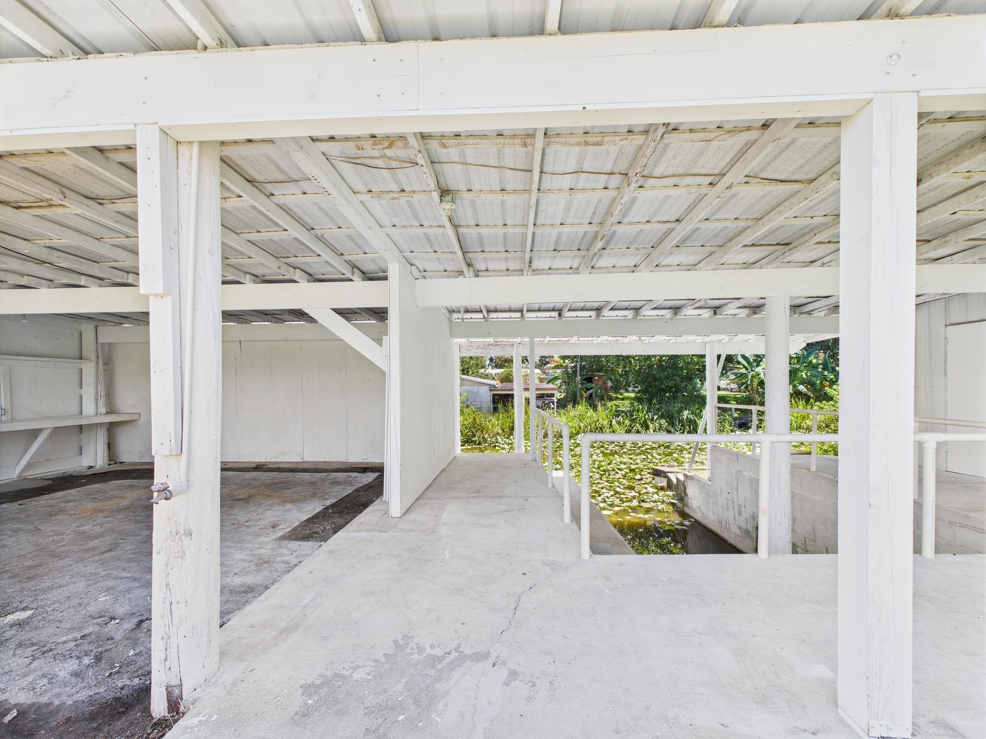 3302 Southeast 34th Avenue Okeechobee, FL 34974 - Photo 39 of 54 a view of front door with outdoor space
