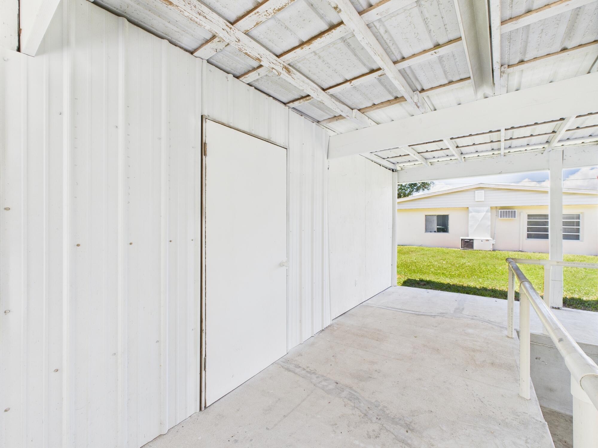 3302 Southeast 34th Avenue Okeechobee, FL 34974 - Photo 41 of 54 a view of a house with a swimming pool