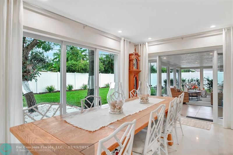 1985 Sailfish Place Pompano Beach, FL 33062 - Photo 13 of 47 a living room with furniture and a large window