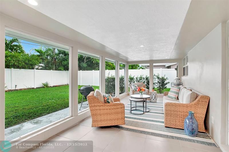 1985 Sailfish Place Pompano Beach, FL 33062 - Photo 41 of 47 a outdoor space with patio the couches and a dining table with garden view
