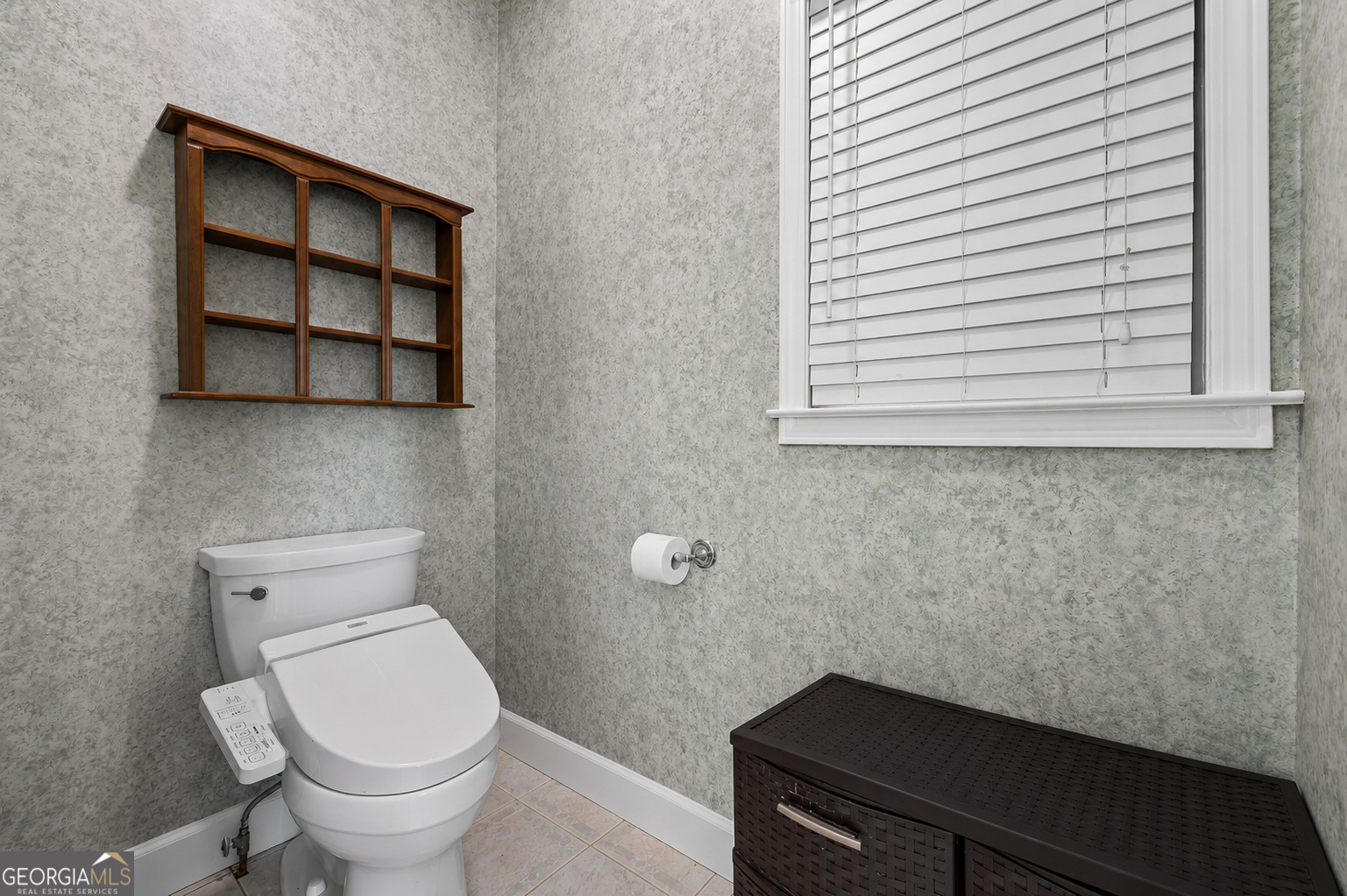 8080 Milford Road Gainesville, GA 30506 - Photo 38 of 82 a bathroom with a toilet and a window