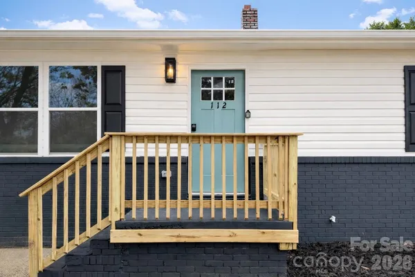 a view of a house with a deck