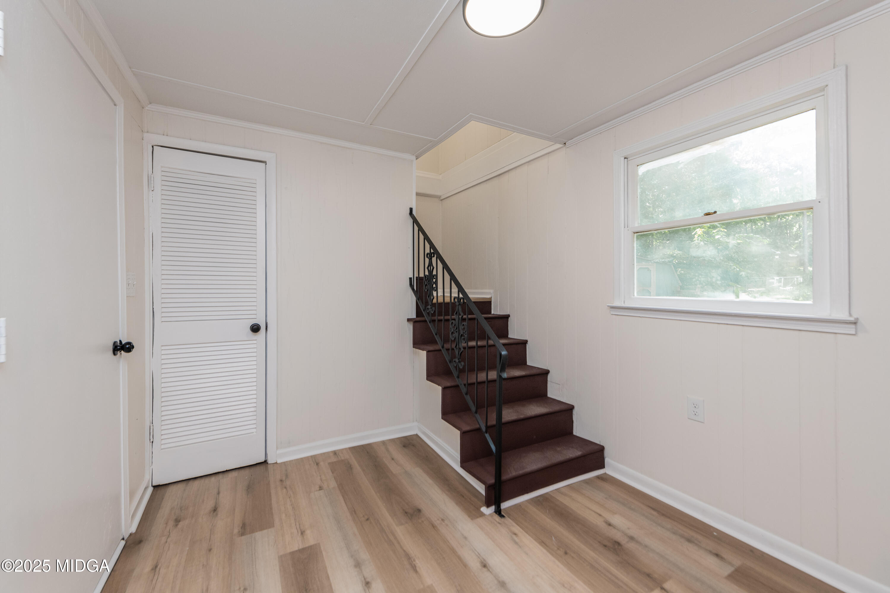 139 Old Oak Road Byron, GA 31008 - Photo 24 of 59 a view of an entryway with wooden floor and stairs