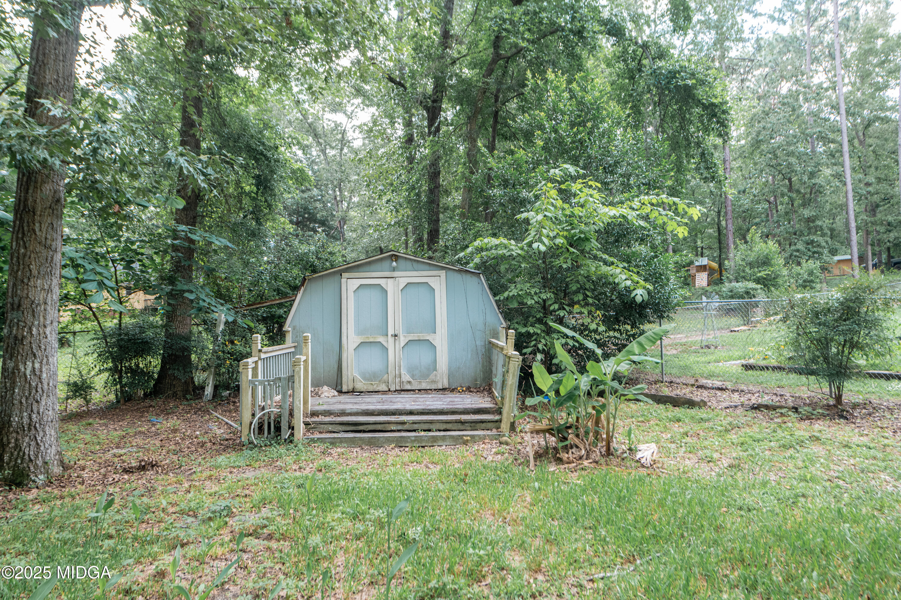 139 Old Oak Road Byron, GA 31008 - Photo 29 of 59 a front view of a house with a yard