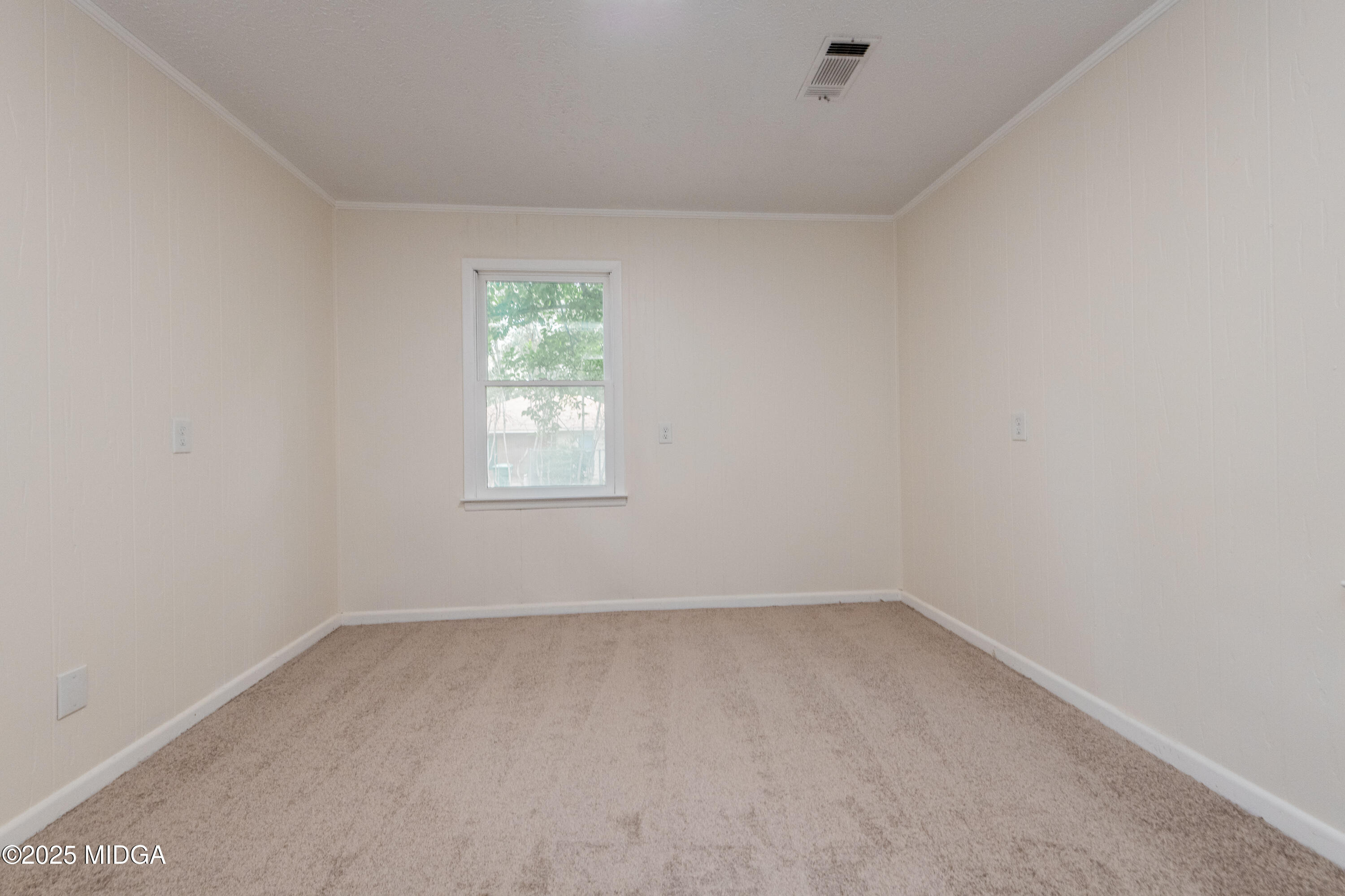 139 Old Oak Road Byron, GA 31008 - Photo 39 of 59 an empty room with a window