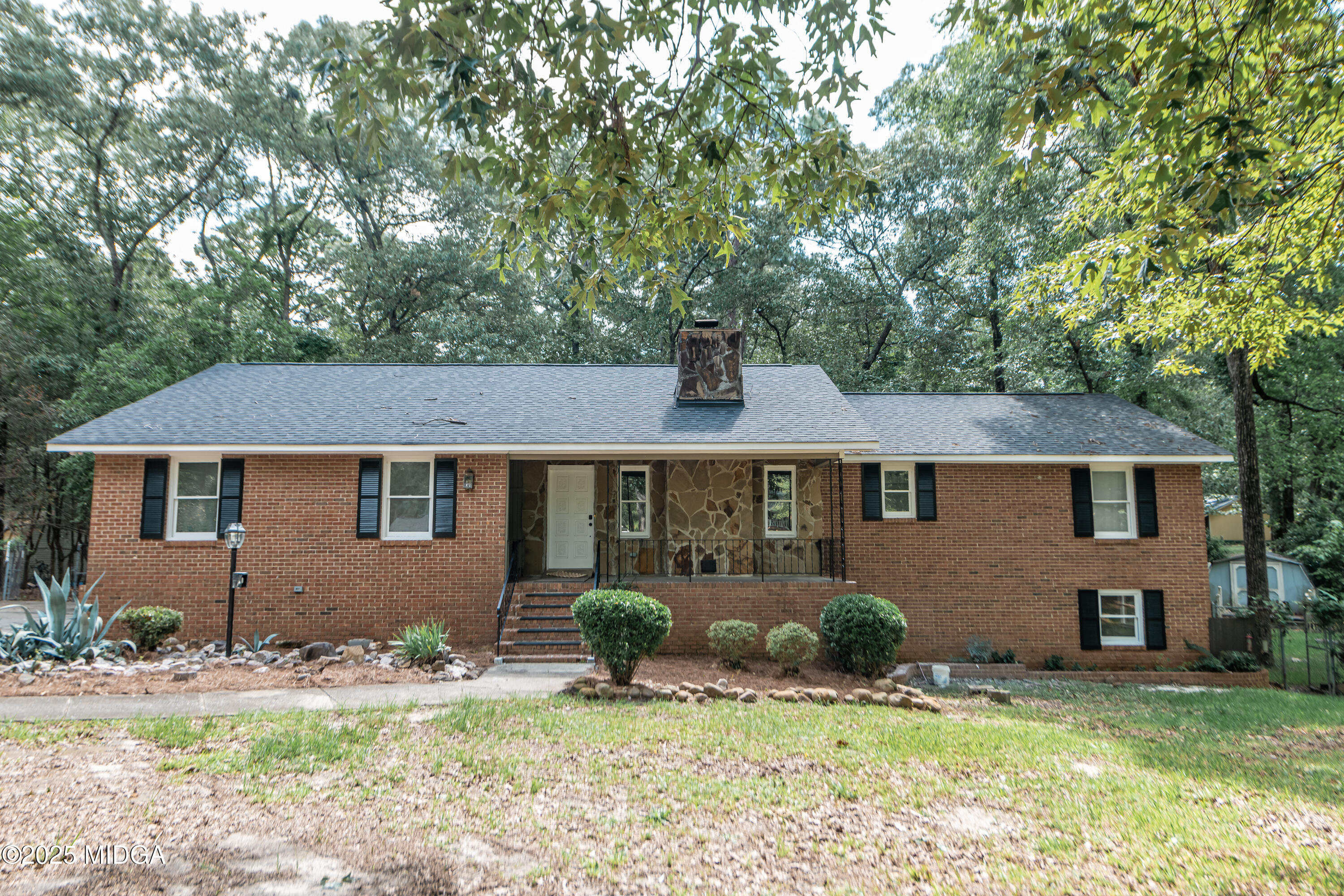 139 Old Oak Road Byron, GA 31008 - Photo 40 of 59 front view of a house with a yard