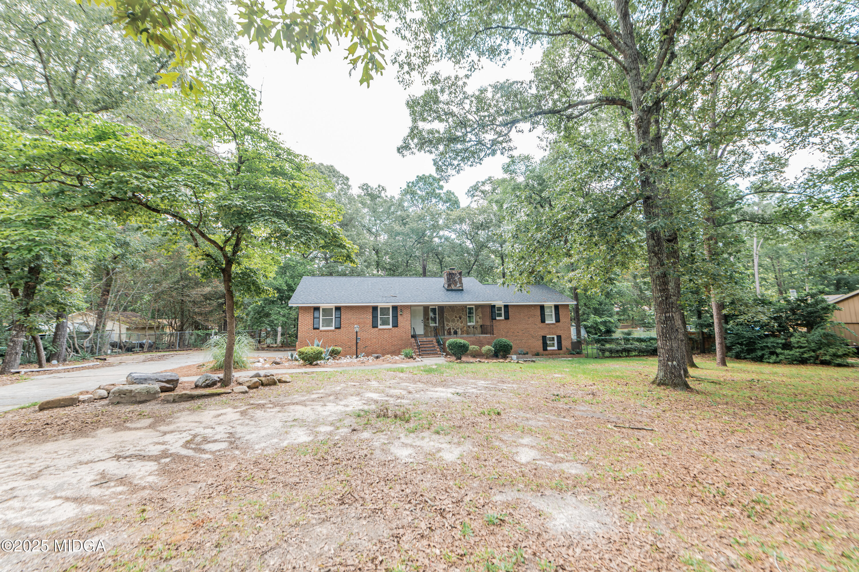 139 Old Oak Road Byron, GA 31008 - Photo 41 of 59 a backyard of a house with yard and tree