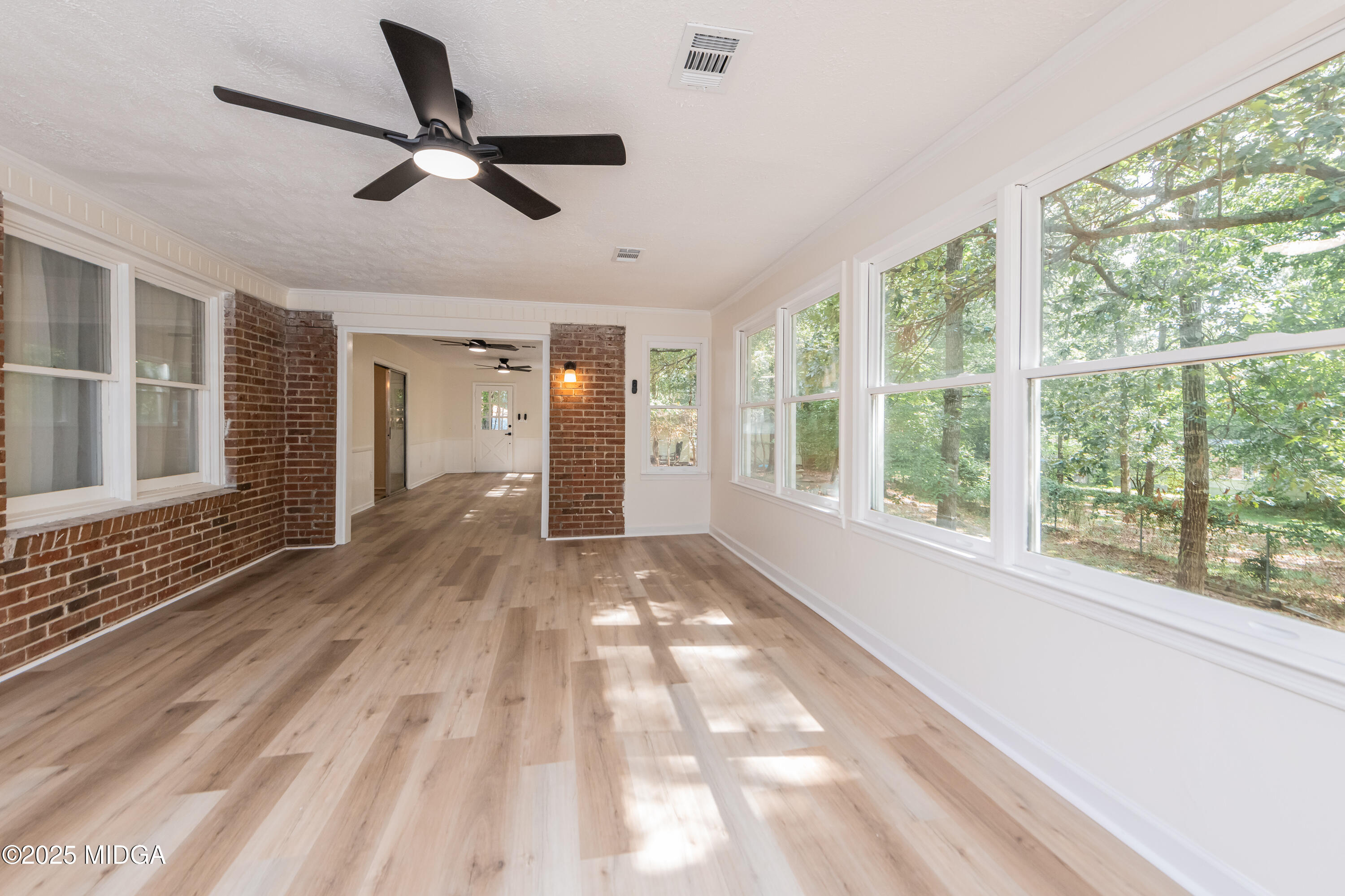 139 Old Oak Road Byron, GA 31008 - Photo 47 of 59 a view of empty room with wooden floor and fan