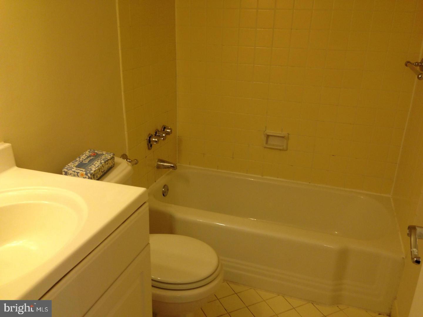 522 21st Street Northwest, Unit 307 Washington, DC 20006 - Photo 2 of 8 a bathroom with a sink and a toilet