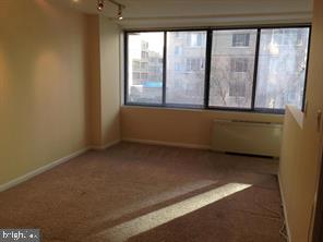 522 21st Street Northwest, Unit 307 Washington, DC 20006 - Photo 6 of 8 a view of an empty room with a window