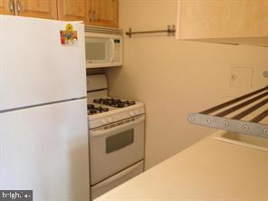 522 21st Street Northwest, Unit 307 Washington, DC 20006 - Photo 7 of 8 a utility room with dryer and washer