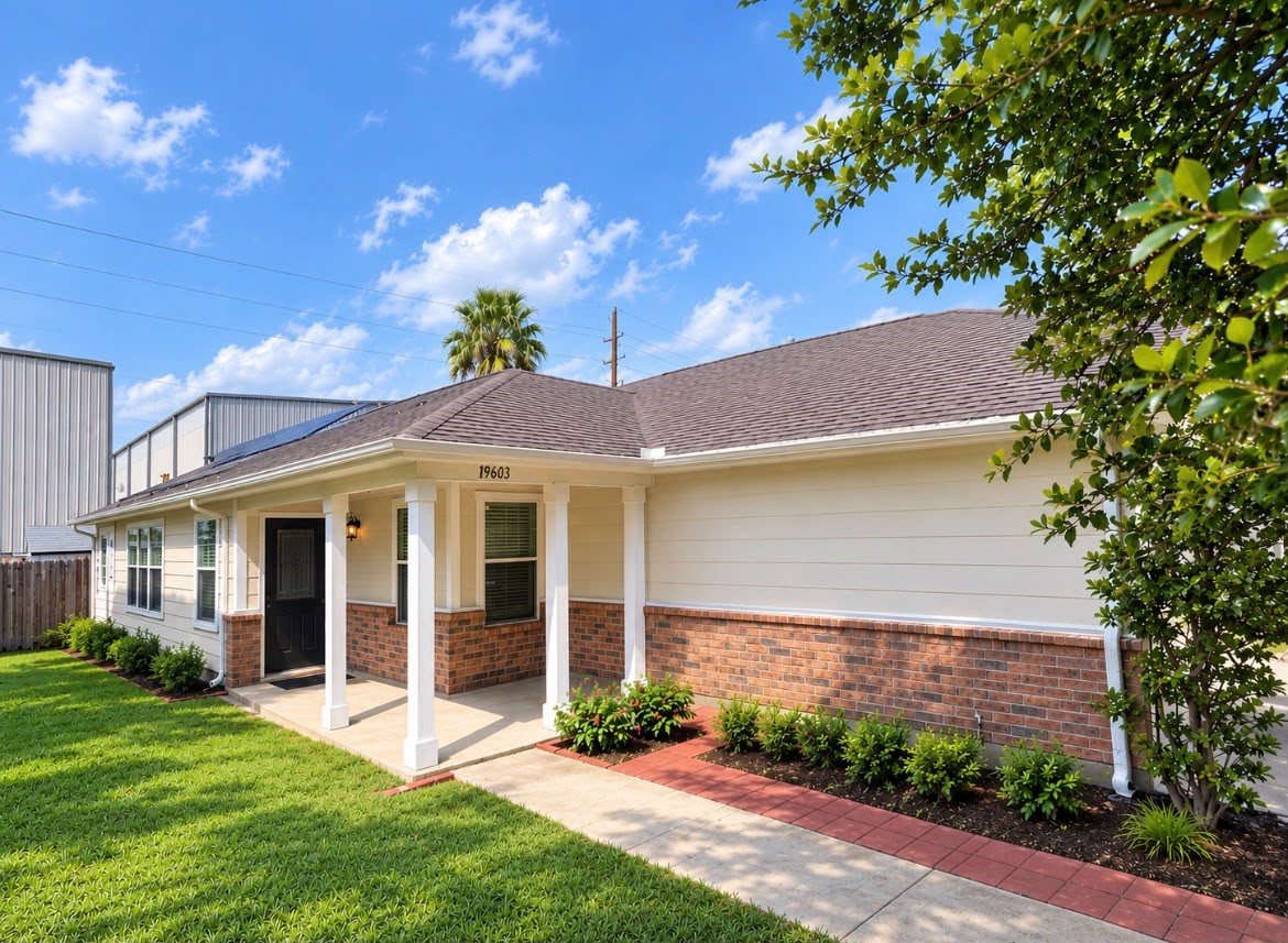 19603 Rippling Brook Lane Tomball, TX 77375 - Photo 16 of 16 Roof with solar panels (AI improved photo)