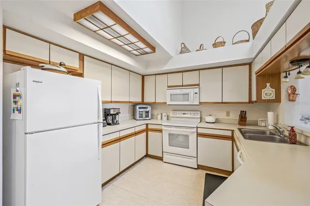 a living room with a book shelf