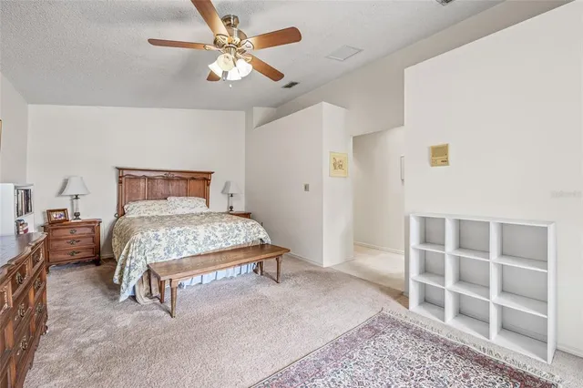 a white toilet sitting next to a bath tub