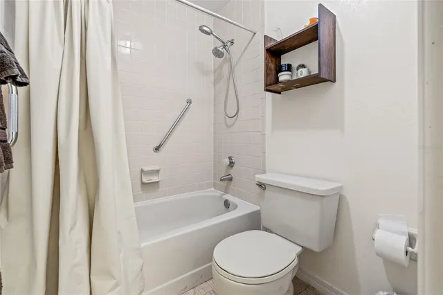 an empty room with a bathroom