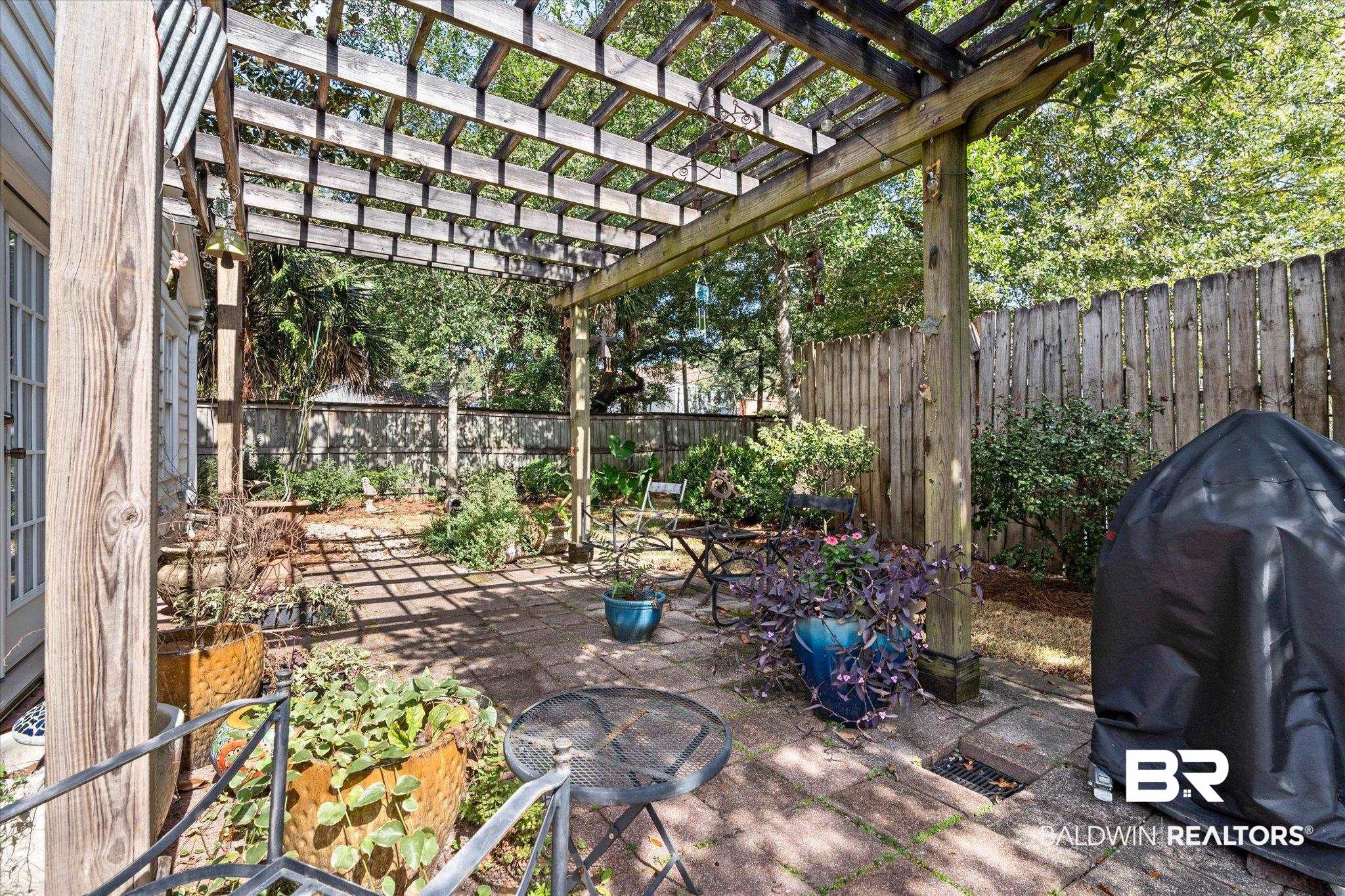202 Woodlands Avenue Mobile, AL 36607 - Photo 34 of 53 View of patio featuring area for grilling and a pergola