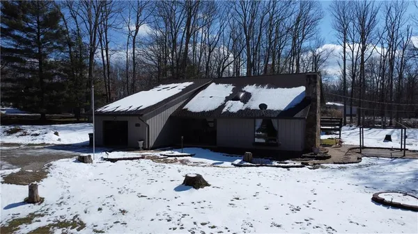 a view of a backyard of the house