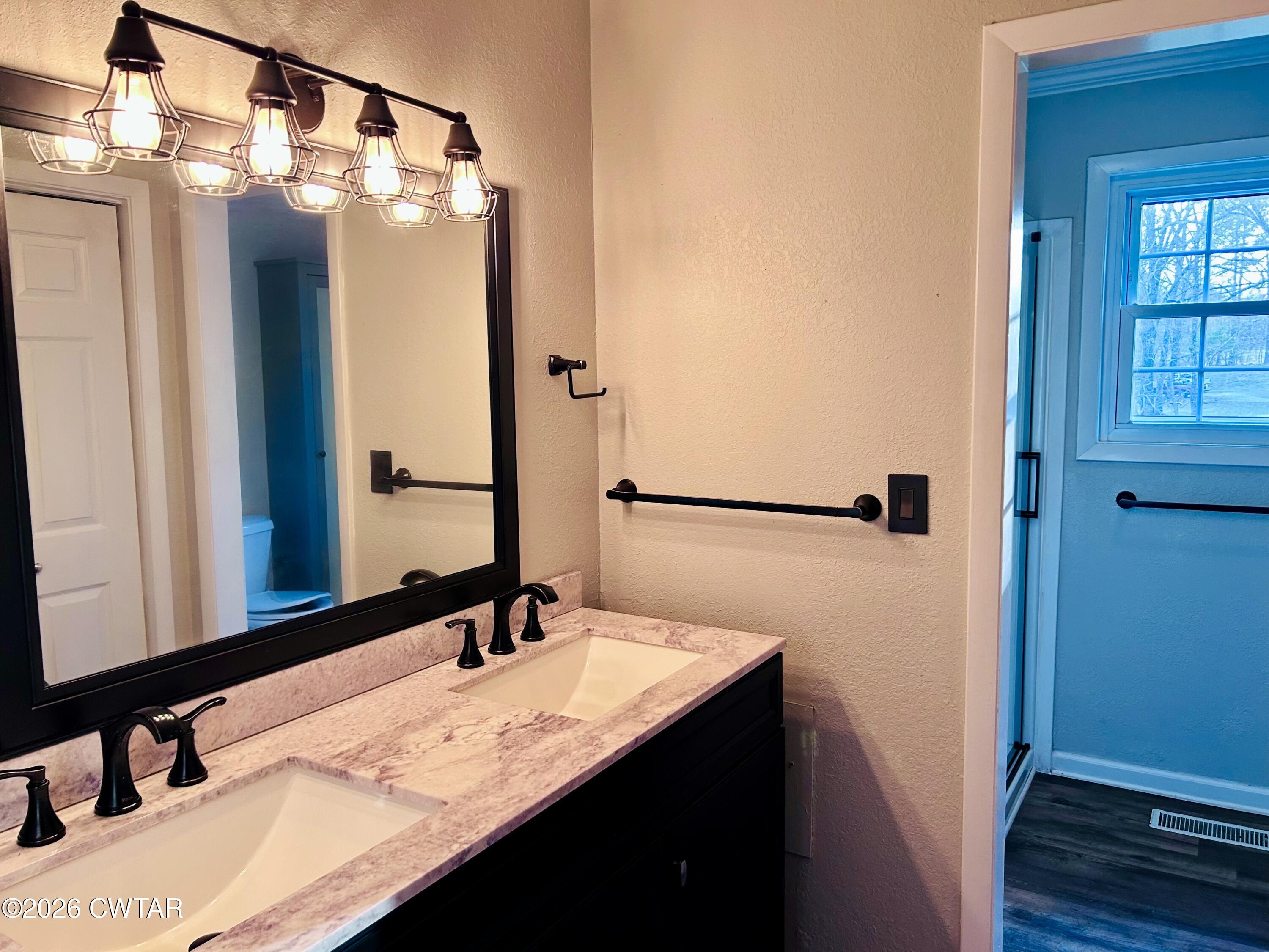 1051 McCaney Mill Road Huron, TN 38345 - Photo 11 of 23 Master Bathroom