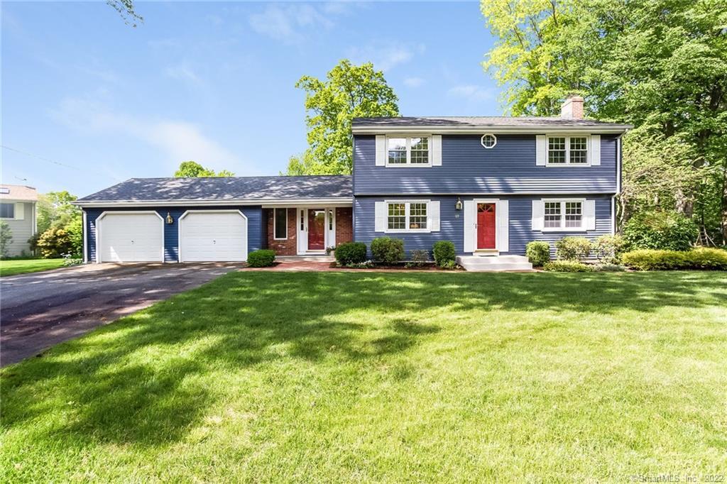 57 Juniper Road Southington, CT 06489 - Photo 1 of 1 a front view of a house with a garden
