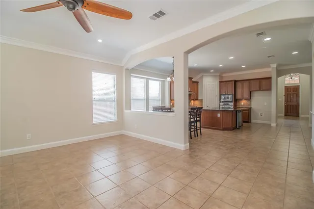 a view of a livingroom with furniture and windows
