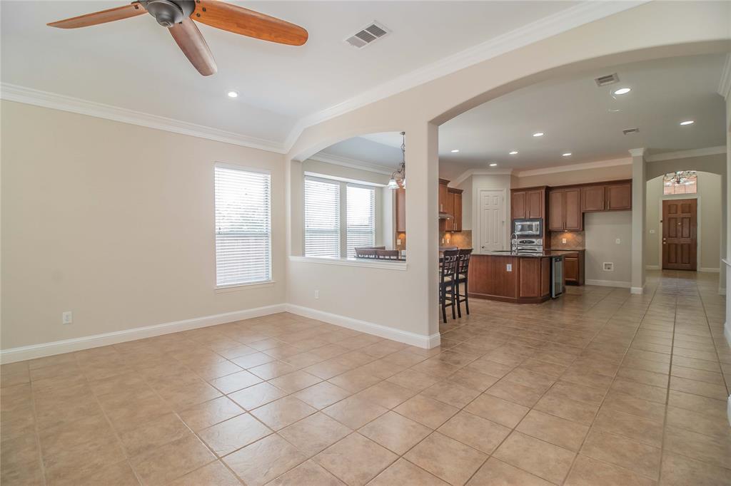 4647 Phillip Drive Plano, TX 75024 - Photo 18 of 38 a view of a livingroom with furniture and windows