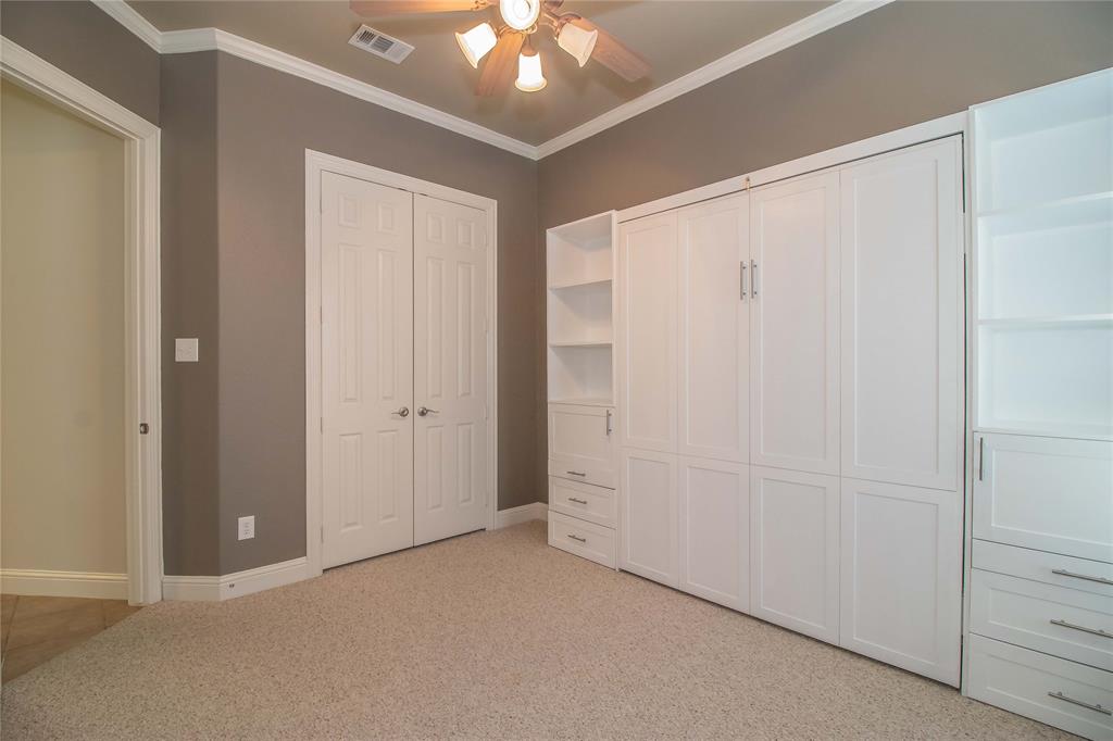 4647 Phillip Drive Plano, TX 75024 - Photo 29 of 38 an empty room with fan