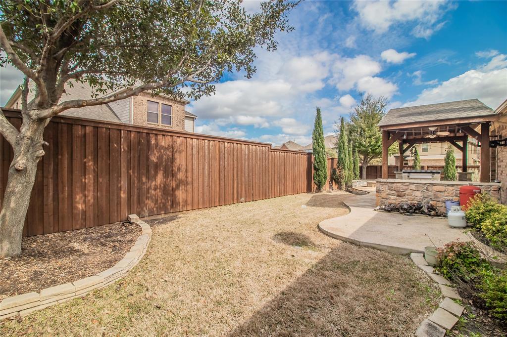 4647 Phillip Drive Plano, TX 75024 - Photo 33 of 38 a backyard of a house
