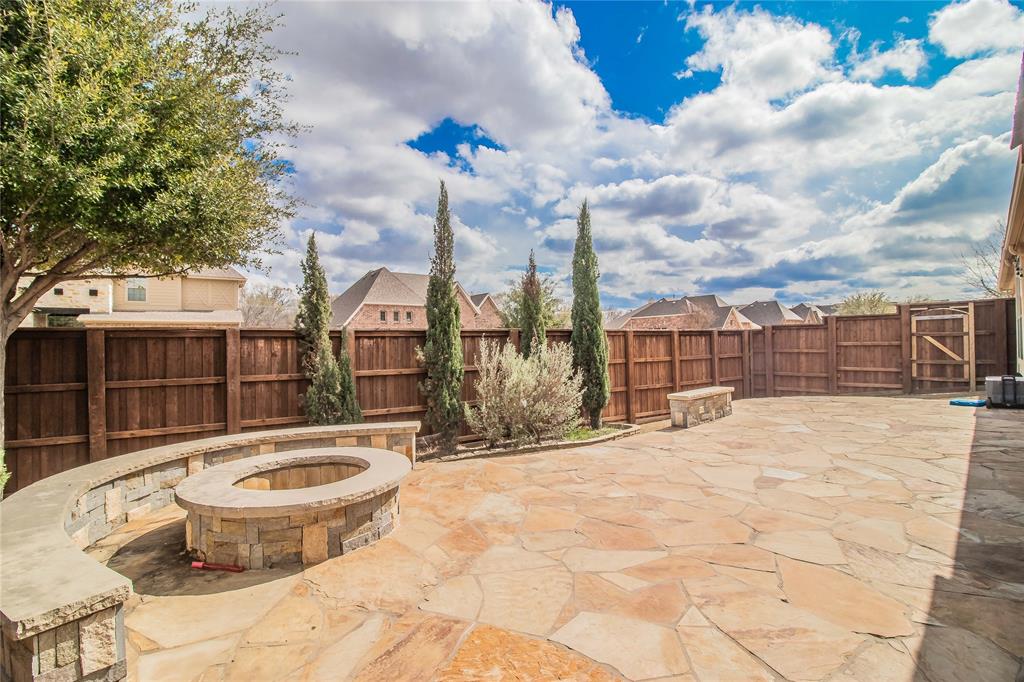 4647 Phillip Drive Plano, TX 75024 - Photo 35 of 38 a view of outdoor space yard and swimming pool