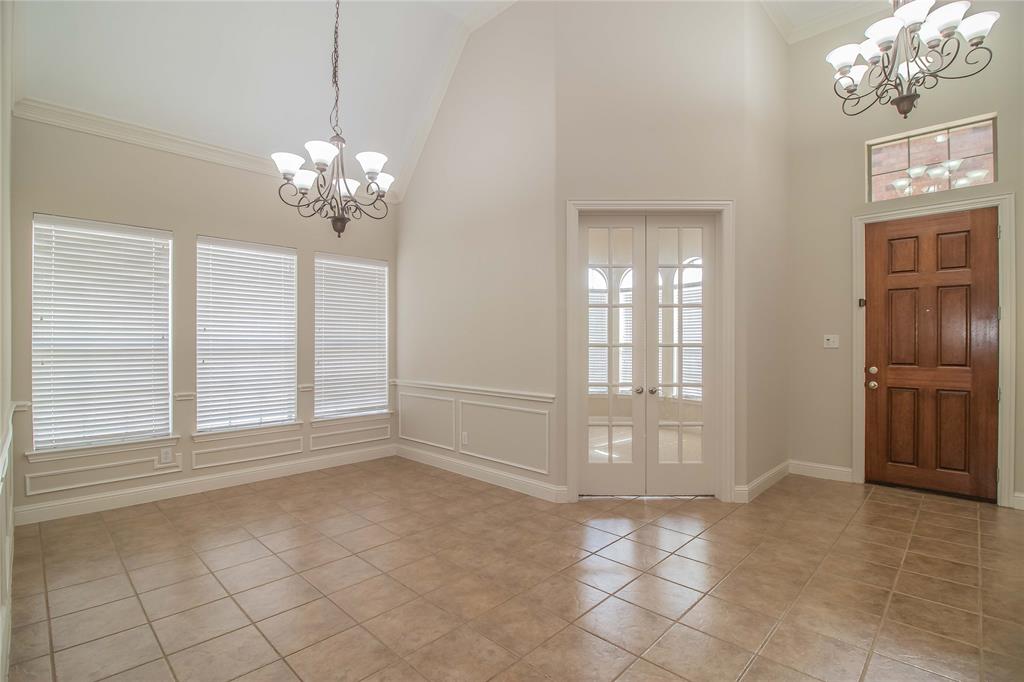 4647 Phillip Drive Plano, TX 75024 - Photo 5 of 38 a view of an empty room with a window