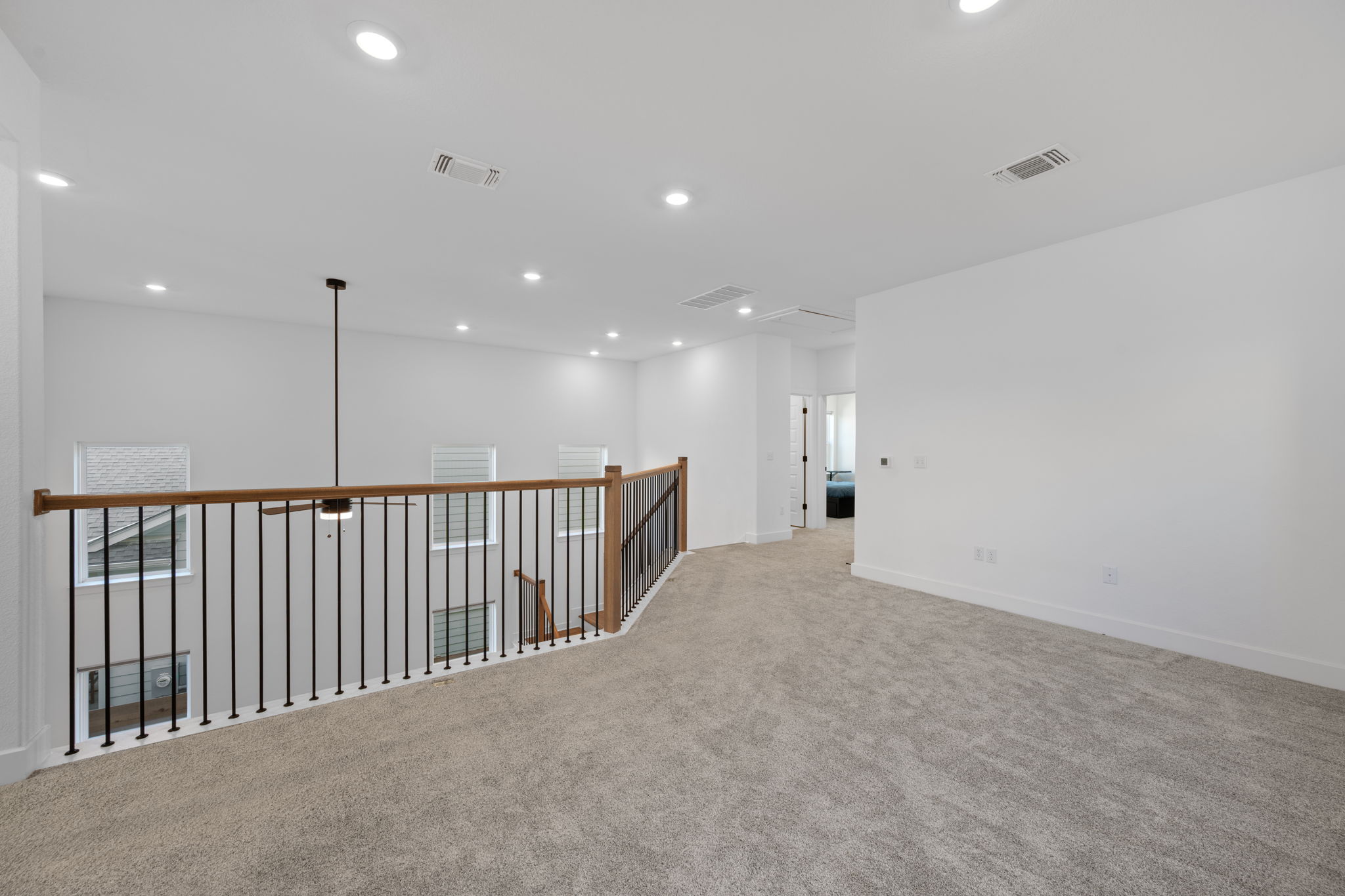 5902 Rangeland Road Austin, TX 78747 - Photo 17 of 35 Carpeted empty room with recessed lighting