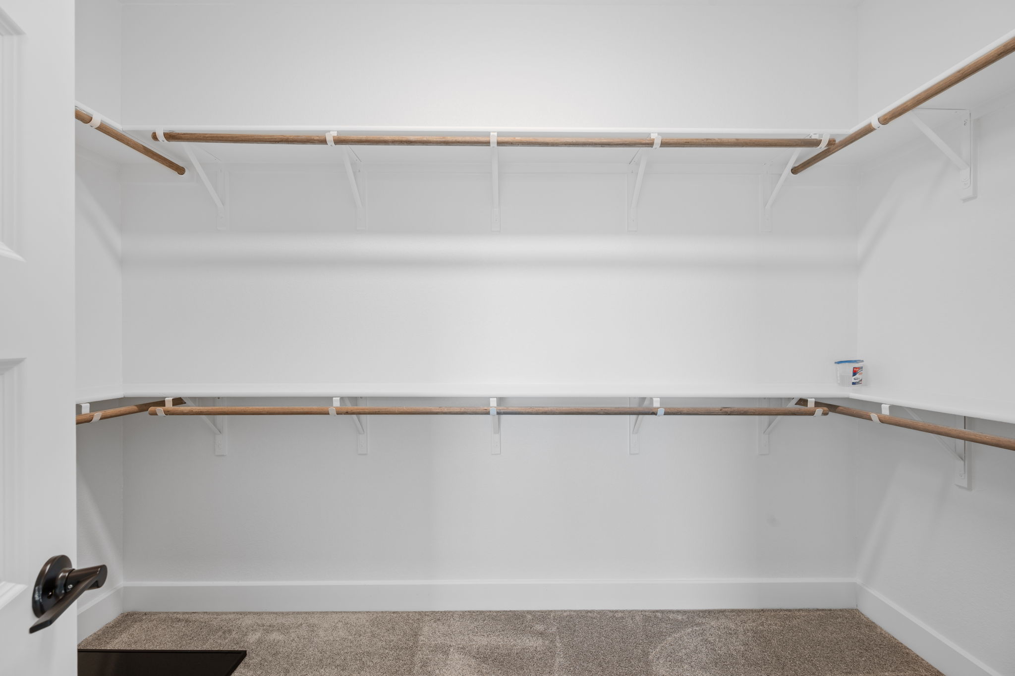 5902 Rangeland Road Austin, TX 78747 - Photo 24 of 35 Walk in closet featuring light carpet