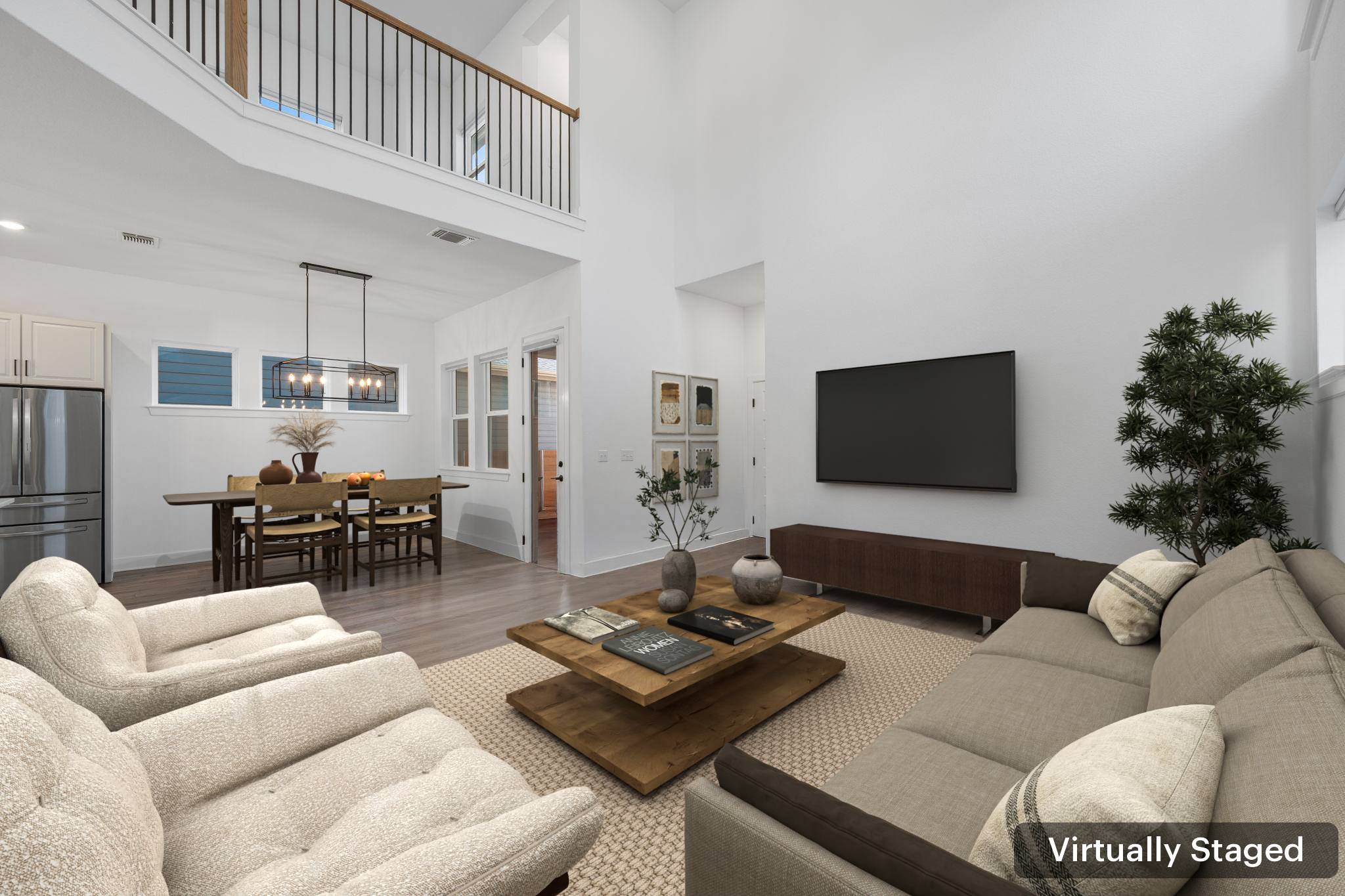 5902 Rangeland Road Austin, TX 78747 - Photo 6 of 35 Living room featuring wood finished floors and a towering ceiling