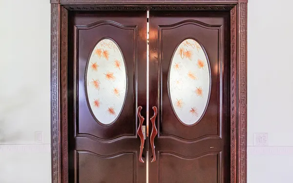 a kitchen with stainless steel appliances kitchen island granite countertop a stove a refrigerator a sink dishwasher with a dining table and chairs with wooden floor