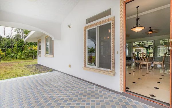 a room with a bed and a mirror